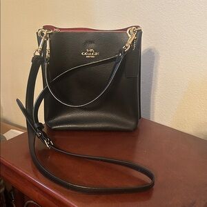 Beautiful Coach black leather shoulder/crossbody purse!